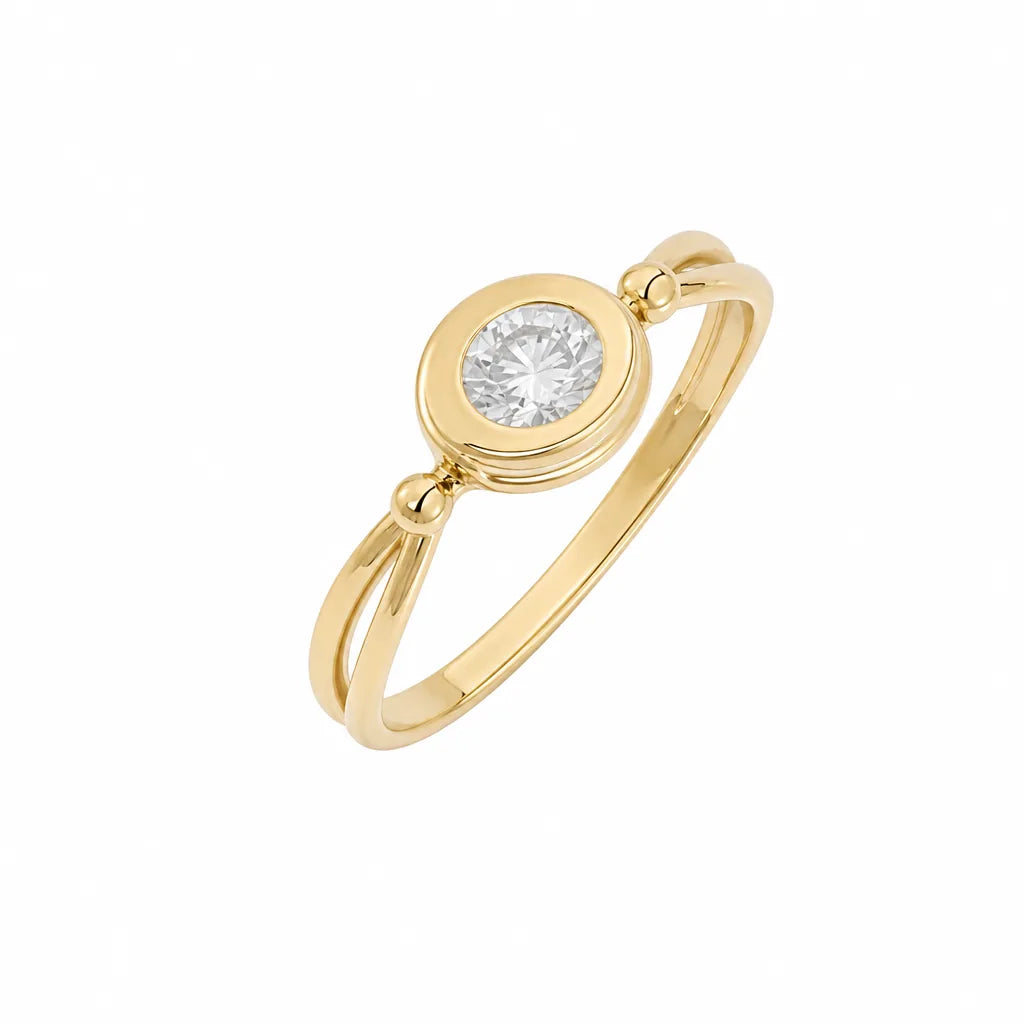 Round bezel solitaire engagement ring, yellow gold