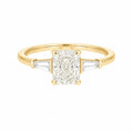 Radiant cut three-stone engagement ring, yellow gold