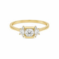 Art deco cluster ring with princess cut accents, yellow gold